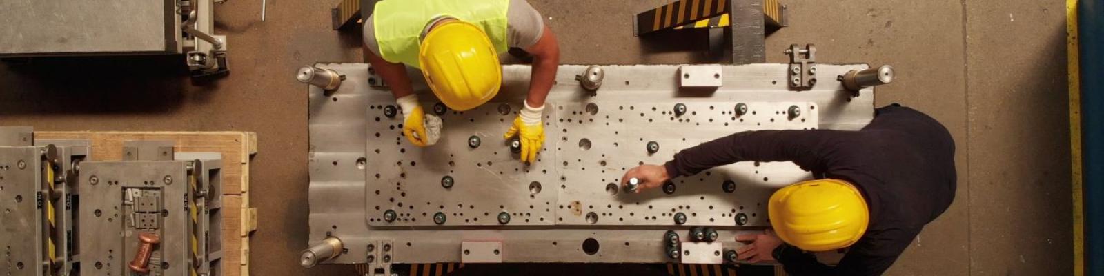 Men working in a plant