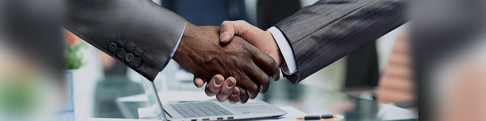 two men shaking hands