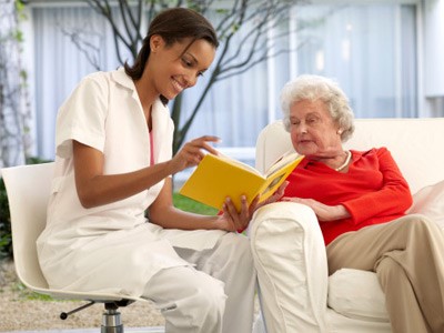 person reading to another person